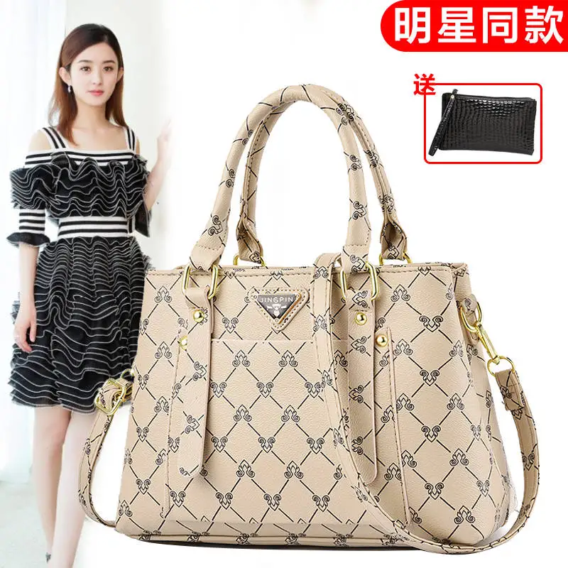

Leather texture atmospheric handbag big bag 2019 new middle-aged female bag wild shoulder Messenger bag
