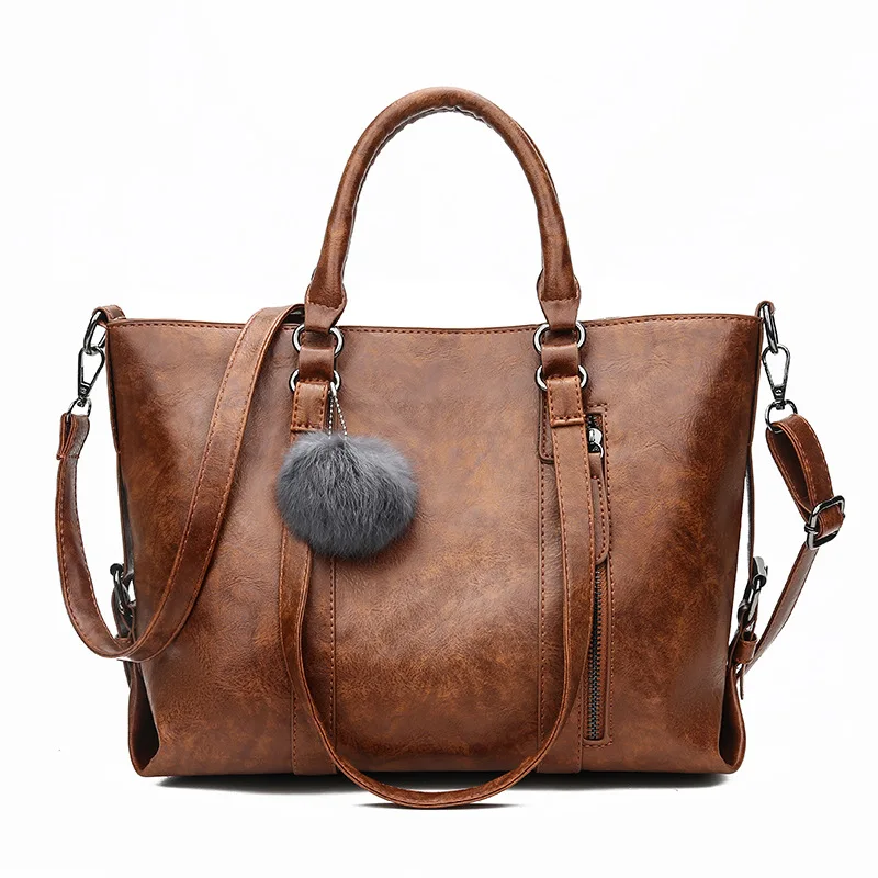 

2019 new retro oilskin women's high-capacity shoulder diagonal bag fur ball pendant handbag