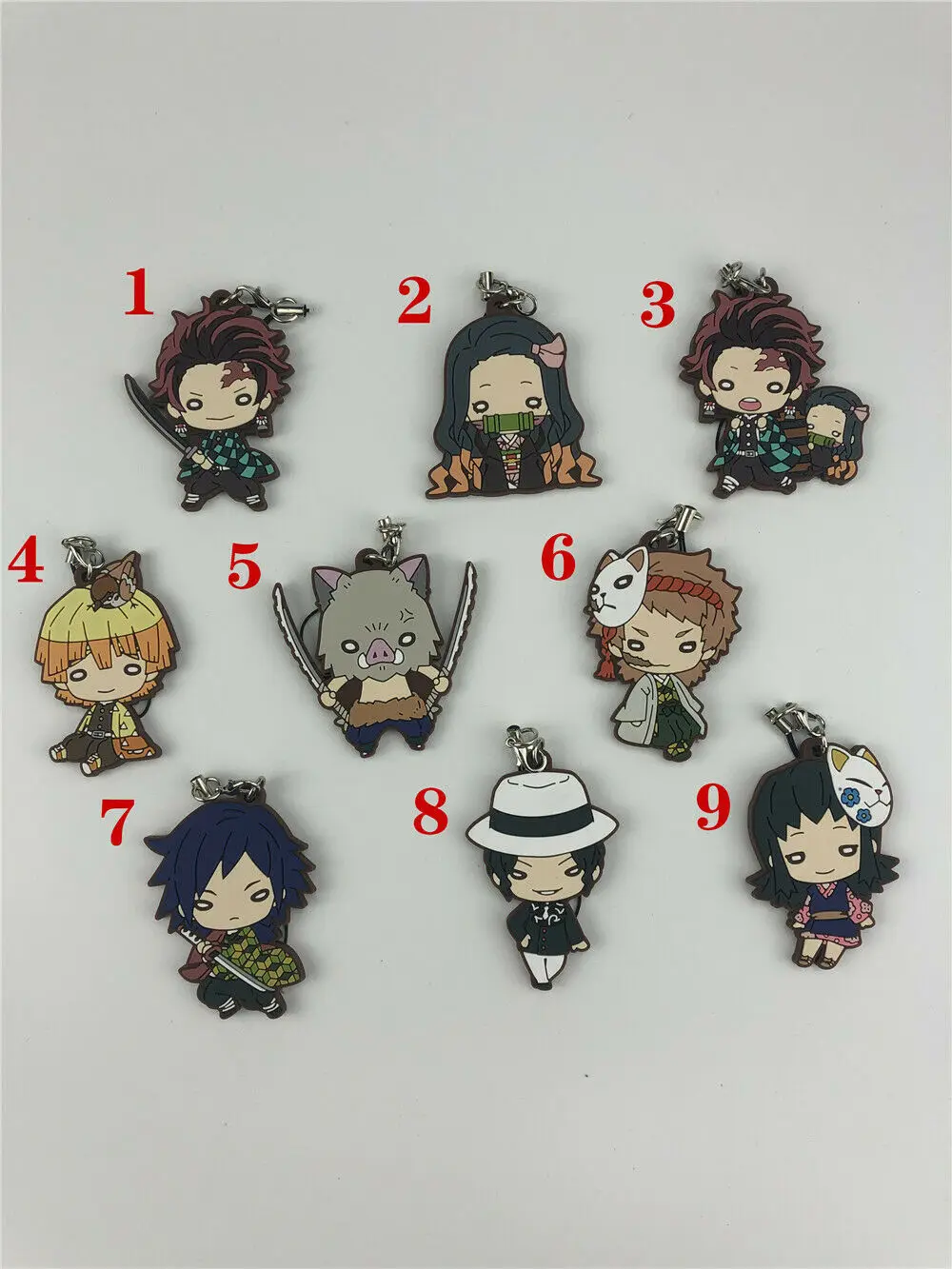 

Anime Demon Slayer Kimetsu no Yaiba rubber Keychain Key Ring Race Straps cosplay