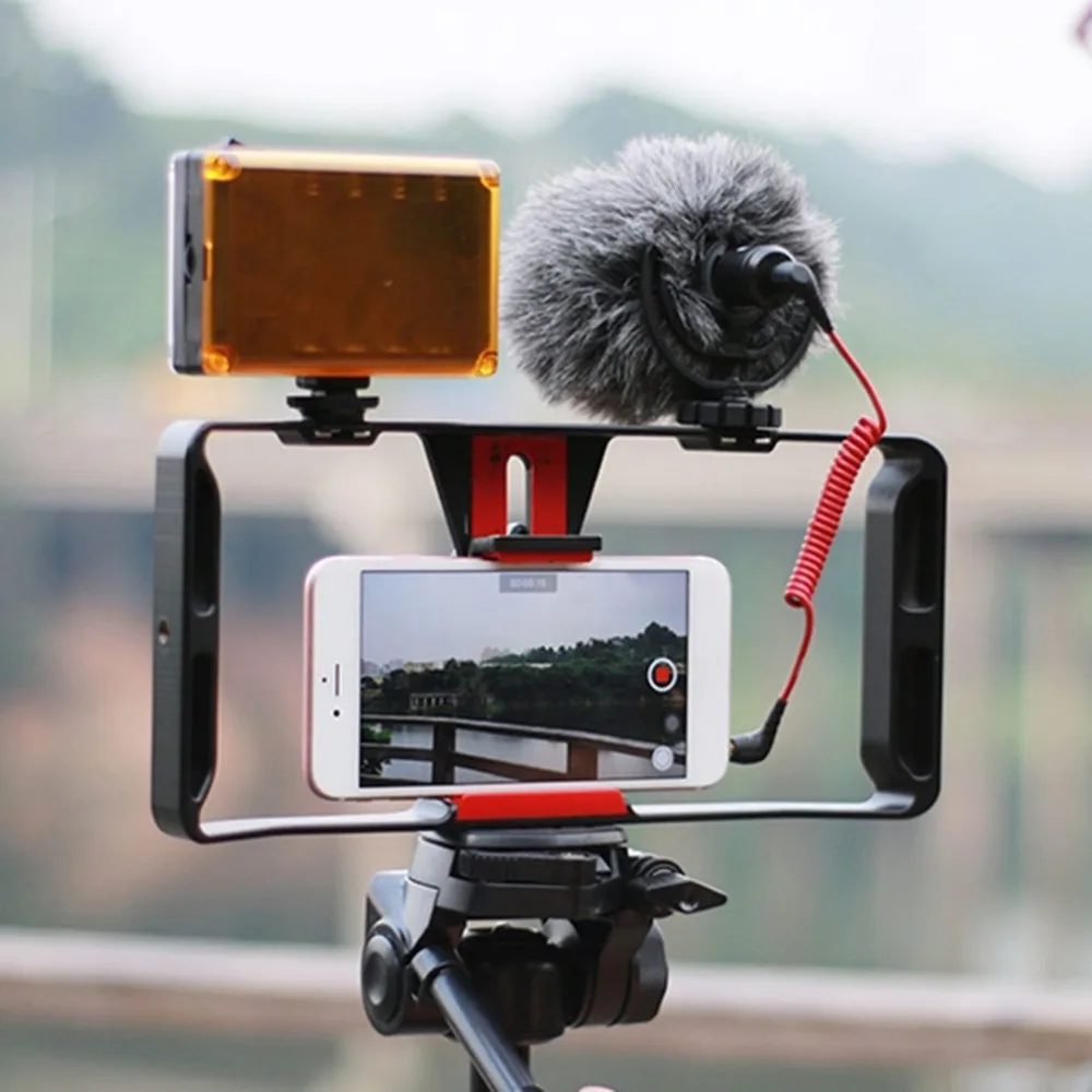 

Video Camera Cage Stabilizer Film Making Rig For Smart Phone Video Rig Mobile Phone Holder Hand Grip Bracket Holder Stabilizer