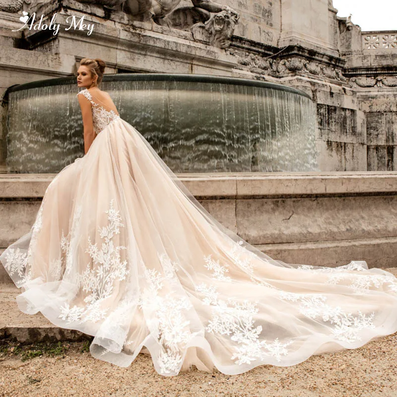 

Adoly Mey Gorgeous Court Train Appliques A-Line Wedding Dress 2020 Sexy V-Neck Backless Beaded Cap Sleeve Princess Bridal Gown