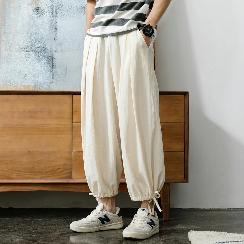

Men's sports pants 2020 spring and summer new loose loose feet wide leg sports pants youth personality fashion trend men's