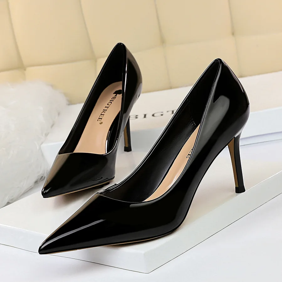 

European and American simple high-heeled shiny patent leather shallow mouth pointy sexy thin professional OL shoes