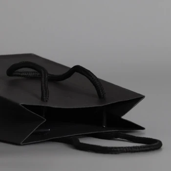 

50pcs/lot 2020 New Development Black Paper Bag Paper Cardboard Gift Bag With Matte Finish