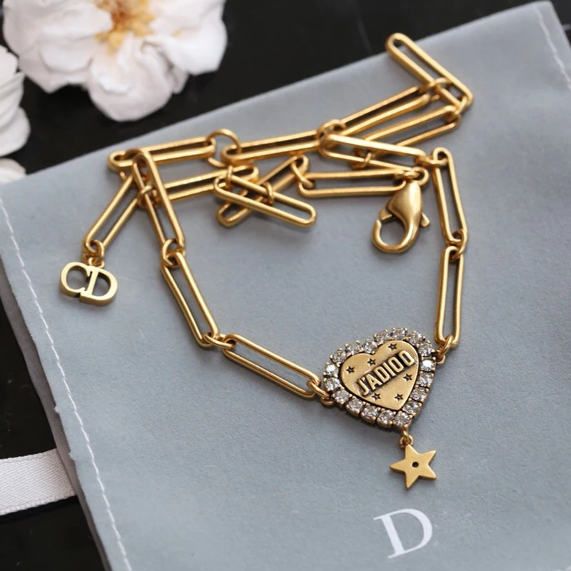 

C1466 Stylish classic brass made old heart inlay with zircon tassel droplet heart pendant necklace bamboo chain female gift