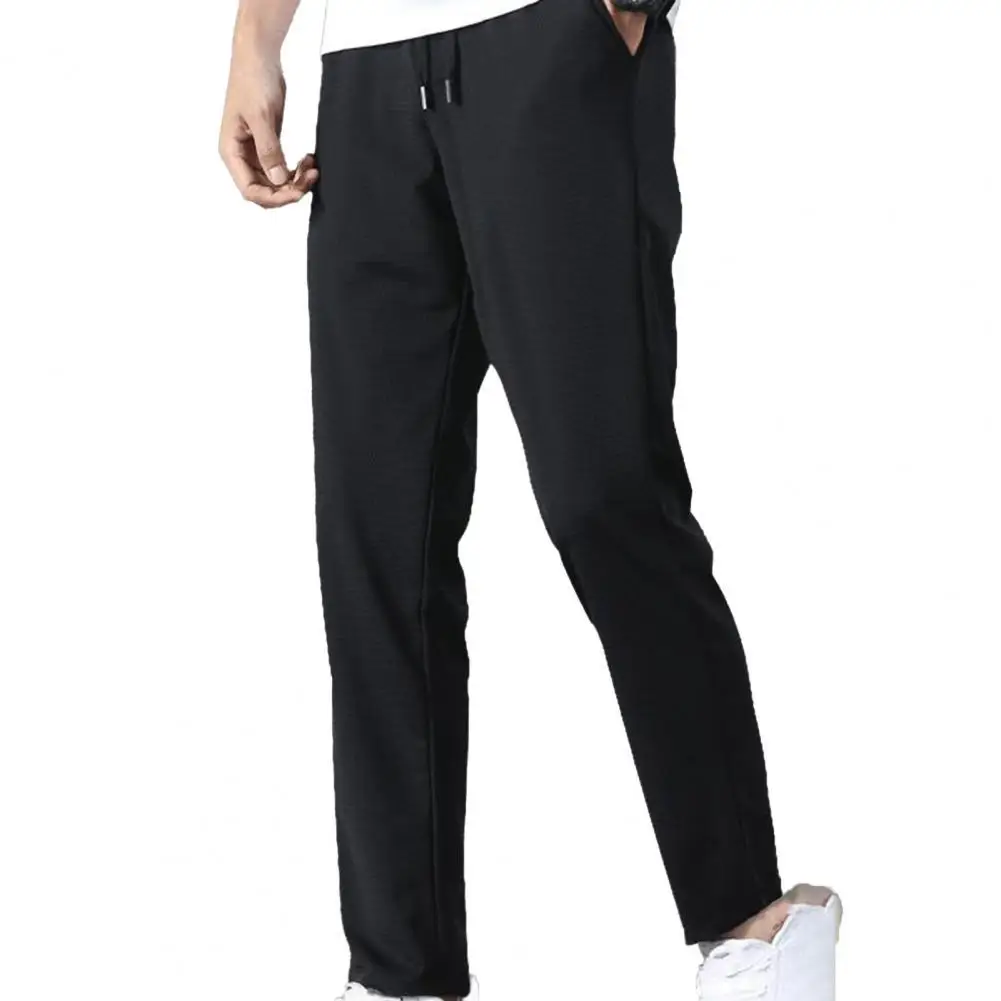 Los hombres deportes pantalones entrenamientos deportivos pantalones de gimnasio pantalones mediados aumento elástico cintura recta noveno pantalones el hielo suelto para hombres, Pantalones