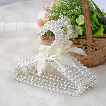 

Home Decoration Accessories Plastic Clothes Hangers Pearl Bow Clothes Rack For Pet Kids Children Hanger Outdoor Drying Rack Gift