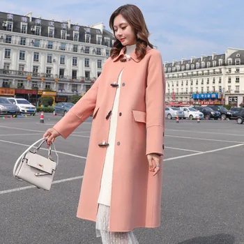 

Woolen coat female long section 2019 winter new Korean version of the loose popular temperament trumpet buckle woolen