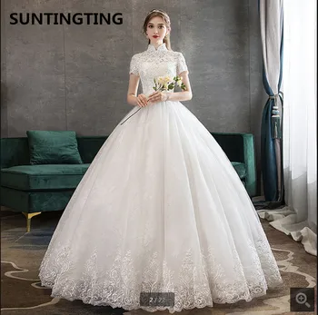 

2020 new arrival white lace beaded ball gown wedding dress high neck hollow back sexy corset bride dress cap sleeve bridal gown