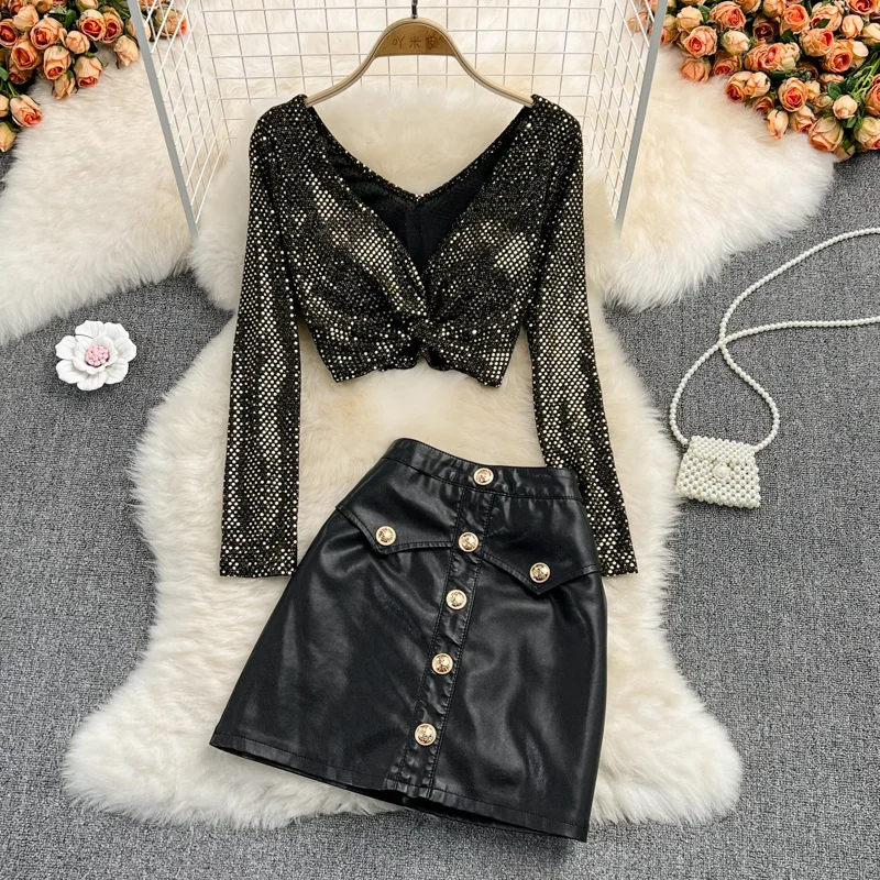 

Women Sexy Cross V-neck Kink Short Navel Exposed Top Two-piece Skirt Suit With High Waist PU Leather Bag Hip Black Skirt Sets