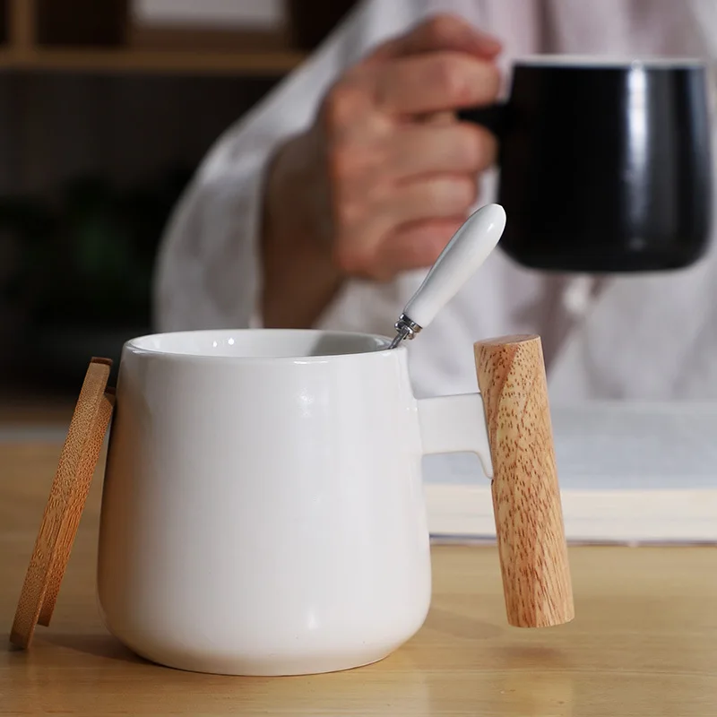 https://ae01.alicdn.com/kf/Hef885bfb079e46f09c00f172377e177dW/Ceramic-Mug-with-Wooden-Handle-Simple-Lovers-Cup-Milk-and-Coffee-Water-Cup-Household.jpg