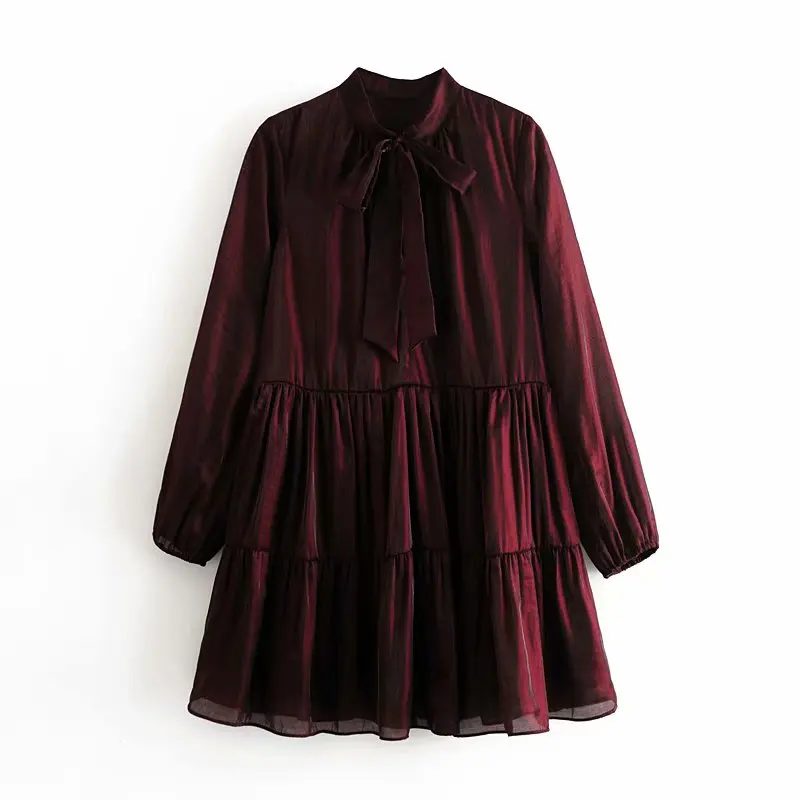 Женское элегантное блестящее мини-платье с воротником-стойкой и бантом