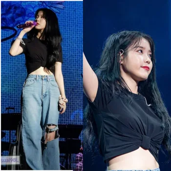 

Li Zhien Jakarta concert with black short bottom knot design t-shirt tattered jeans