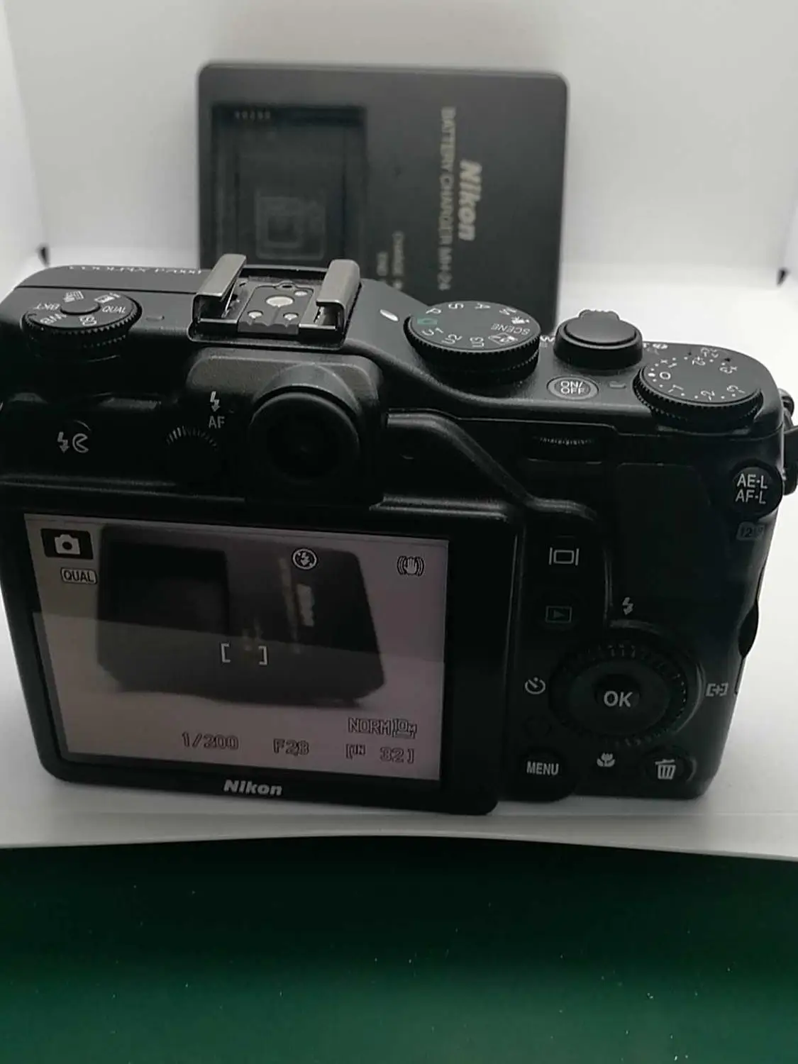  USED Nikon Coolpix P7000 10.1 MP Digital Camera with 7.1x Wide Zoom-Nikkor ED Lens and 3-Inch LCD