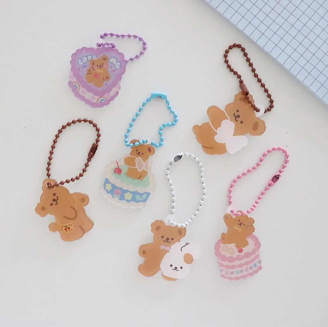 Llavero con colgante decorativo de dibujos animados para niñas, bonito llavero de oso y pastel de ángel coreano, mochila Airpods, accesorios creativos, adorno Kawaii