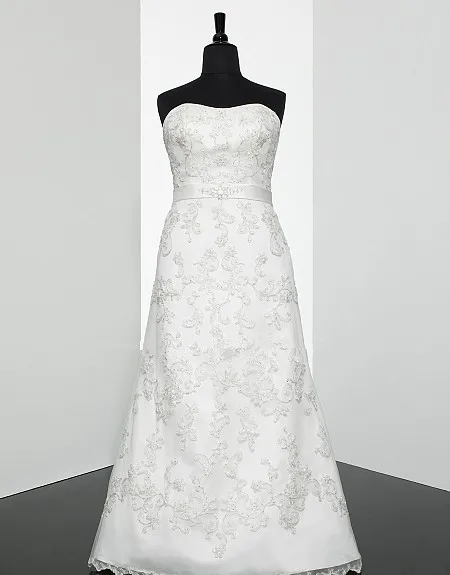 

modified strapless A-line open back corset Embroidered lace sash intricately beaded medallion natural waistline wedding dress
