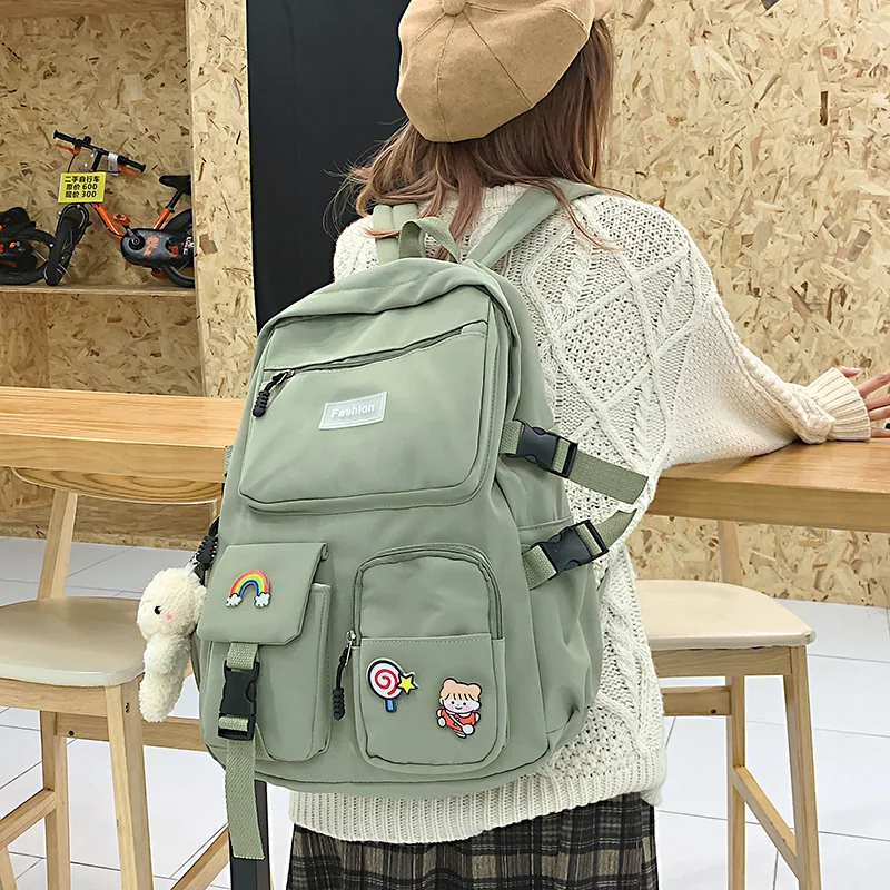 

Kawaii Women Backpack College Student School Bag Cute Badge Multiple Pocket Nylon Backpack Female Fashion Travel Bag Book 2022