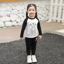 T Shirt manches longues pour fille, haut en Patchwork, noir et blanc, avec lettres coréennes, dessin animé imprimé, printemps automne, 2022
