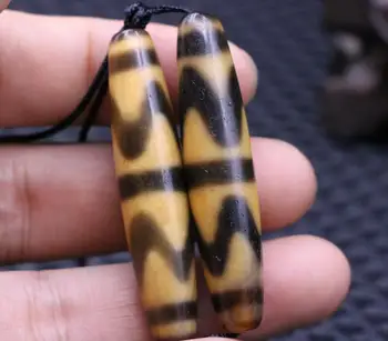 

pair of Magic Tibetan Old Agate Ivory Color tiger-tooth dZi Bead Amulet 54mm Pendant
