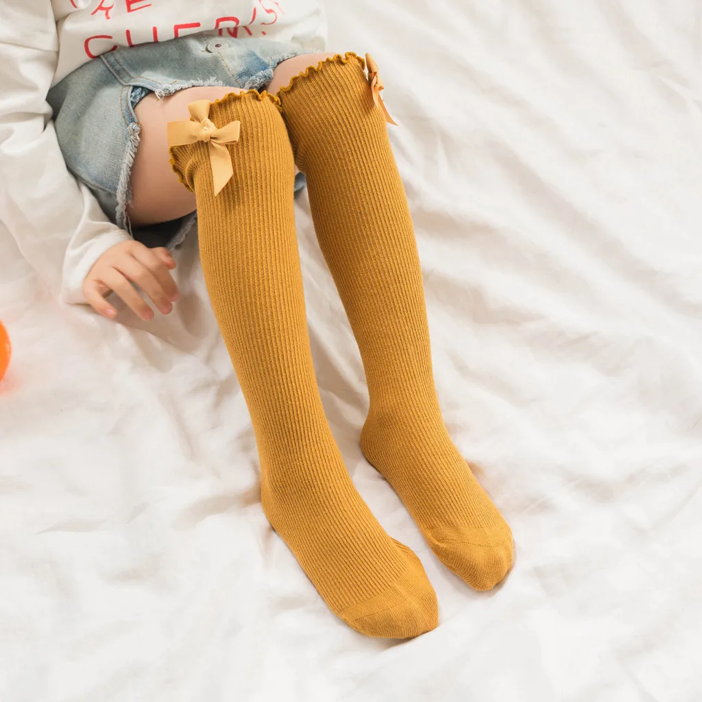 

New Design Fashion Unisex Winter Warm Girls Solid Long Socks Anti-Slip Knitted Frilled bow Knee Socks Free size Christmas gift