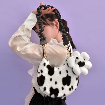 

Three-in-one cow-printed underarm bag plush bag female autumn/winter hundred sloping one-shoulder carrying crescent bag.