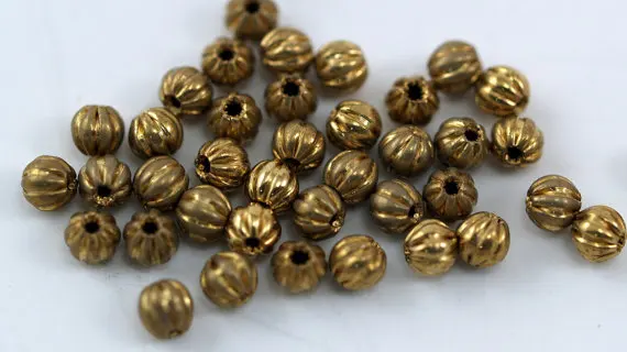 

100 Raw Brass Spacer Pumpkin Beads , Findings (3 mm) brs 500