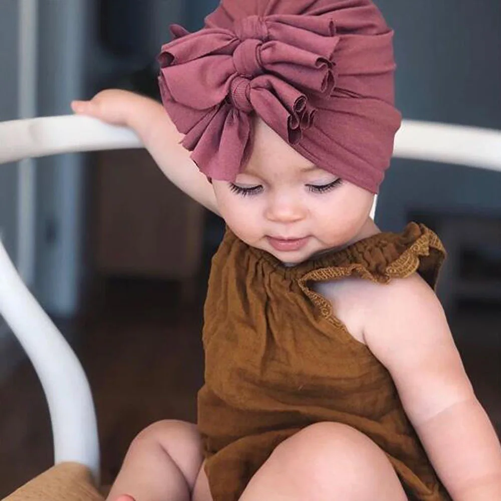 

Infant Newborn Solid Color Pleated Hats Bow Twist Knot Turban Bow Baby Girls Cap Hat Cotton Soft Bebes Head Hoop Infant Beanies