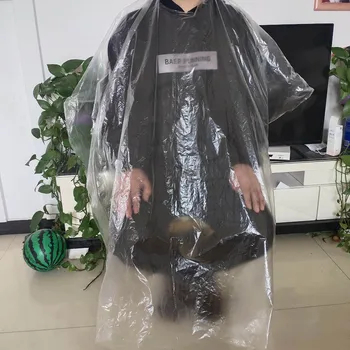 

50pcs Disposable Hairdressing Capes PE Haircutting Perm Dye Hair Cape Barber Transparent Hairdressing Cloth Waterproof Apron