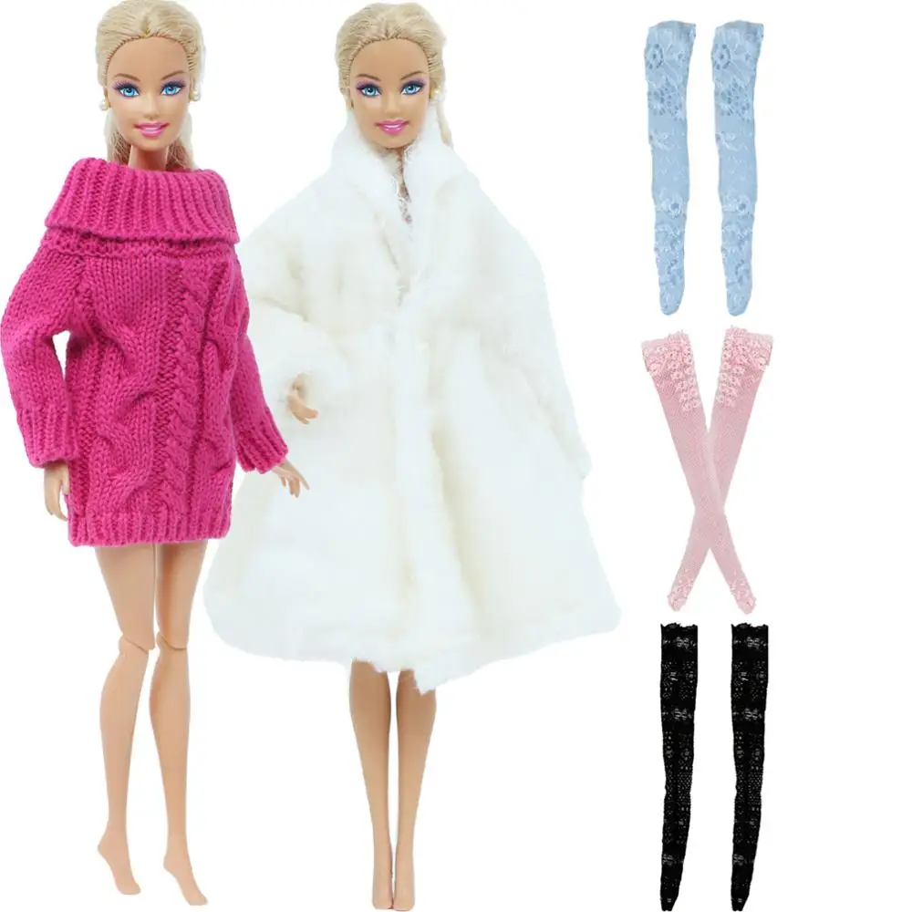 Boneca barbie em roupas de inverno da moda
