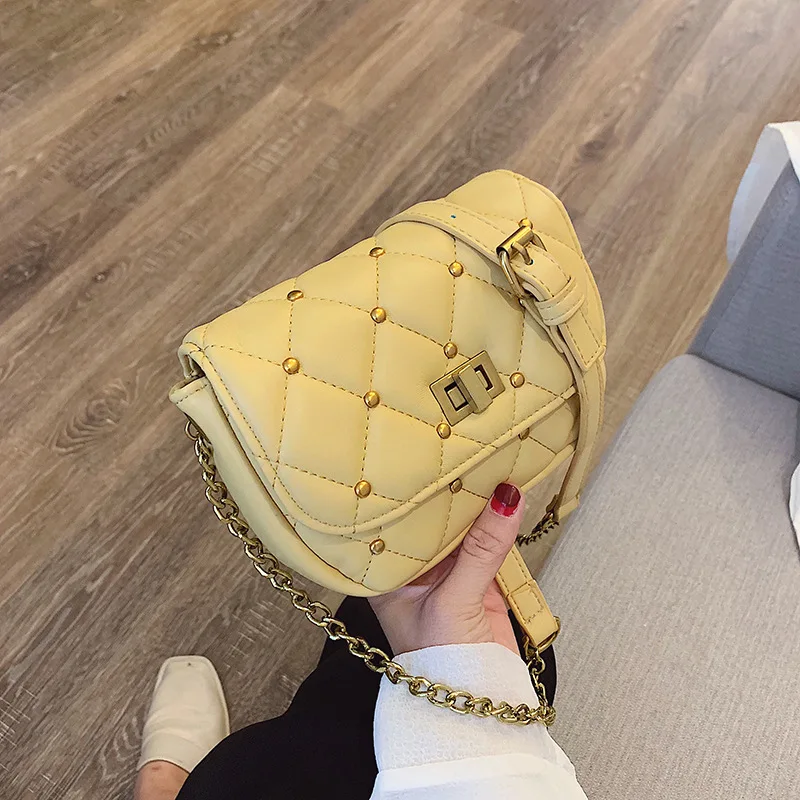 

New Chaohuan version of the 2009 Chaohua Baitao one-shoulder slanting fashion rivet rhombus chain and small square bag