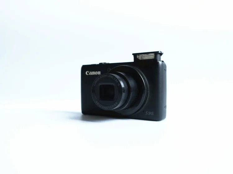 USED Canon PowerShot S95 10 MP Digital Camera with 3.8x Wide Angle Optical Image Stabilized Zoom and 3.0-Inch LCD