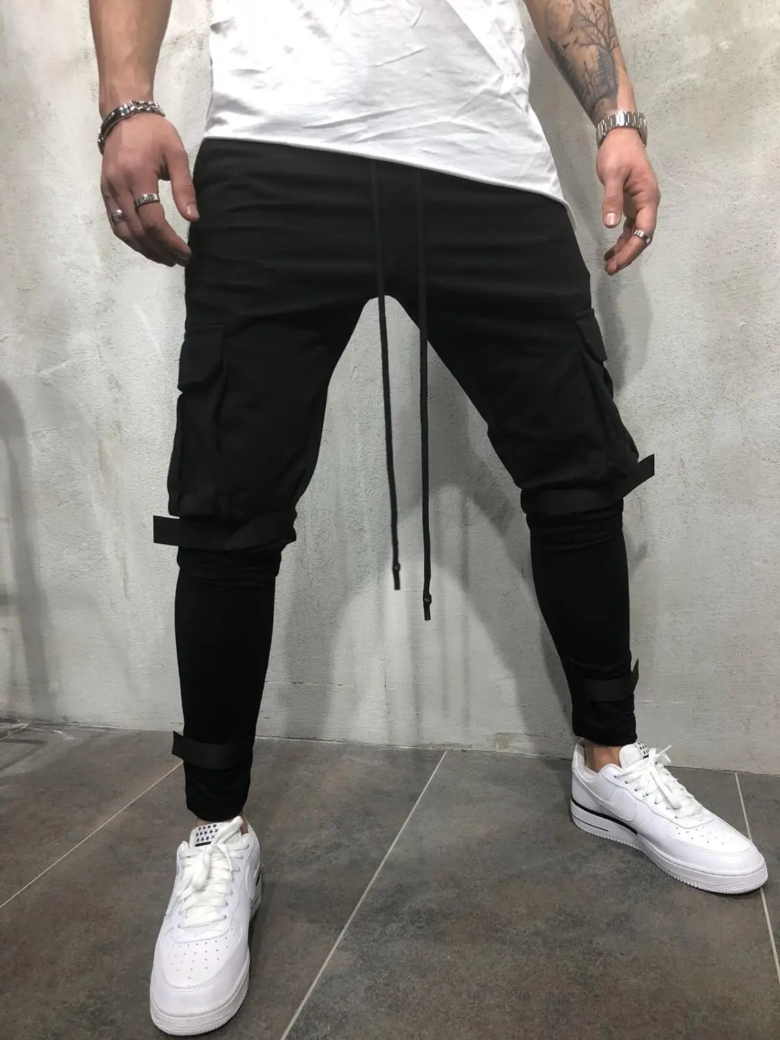

Spring and autumn new brand men's trousers solid color slim casual sports pencil pants men's fitness pants off white