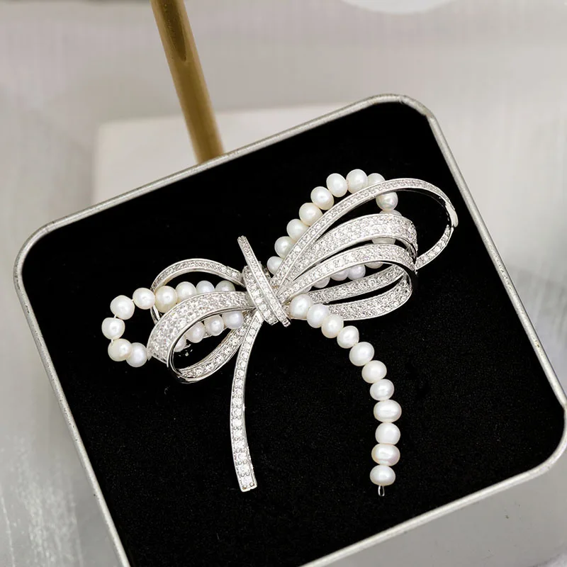 

Korean Elegant Bowknot Brooch Pin Natural Freshwater Pearl Brooches for Women Inlaid Zircon Suit Jacket Sweater Pins Female Gift