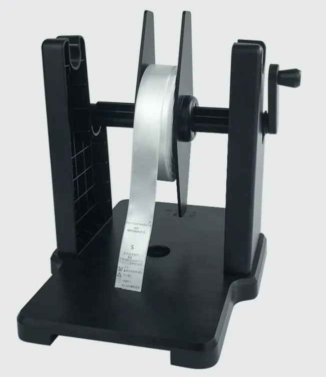 

Manually operated label rewinder bar code printer paper holder