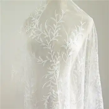 

Exquisite Venice Lace Fabric In Ivory Leaf Embroidered Tulle Fabric For Wedding Bridal Gowns 1 Meter