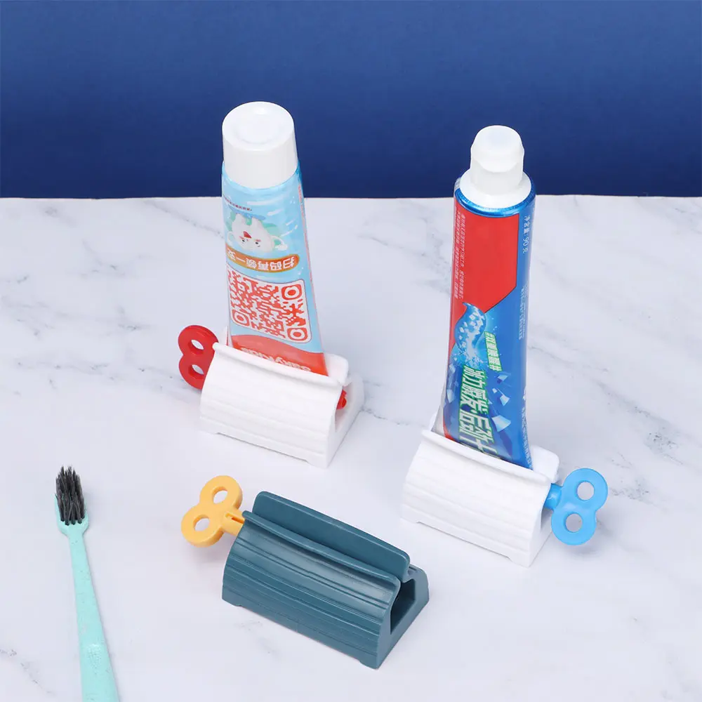 Exprimidor de Tubo dispensador de pasta de dientes para pasta de dientes, prensa limpiadora Facial, soporte enrollable de plástico, accesorios de baño para el hogar