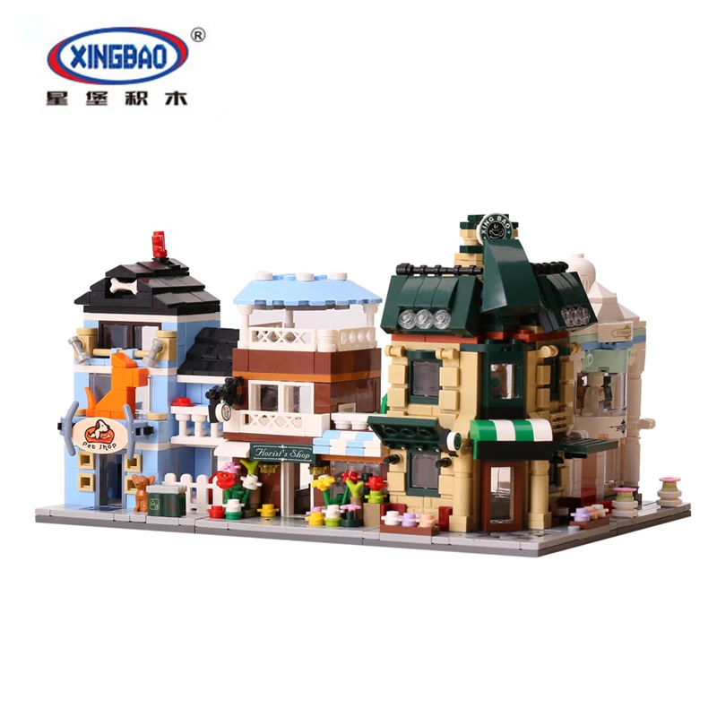 

Xingbao 01105 1079 PCS City Series Creative Mini Four in One Street View Children Assemble Small Particle Toys Building Blocks