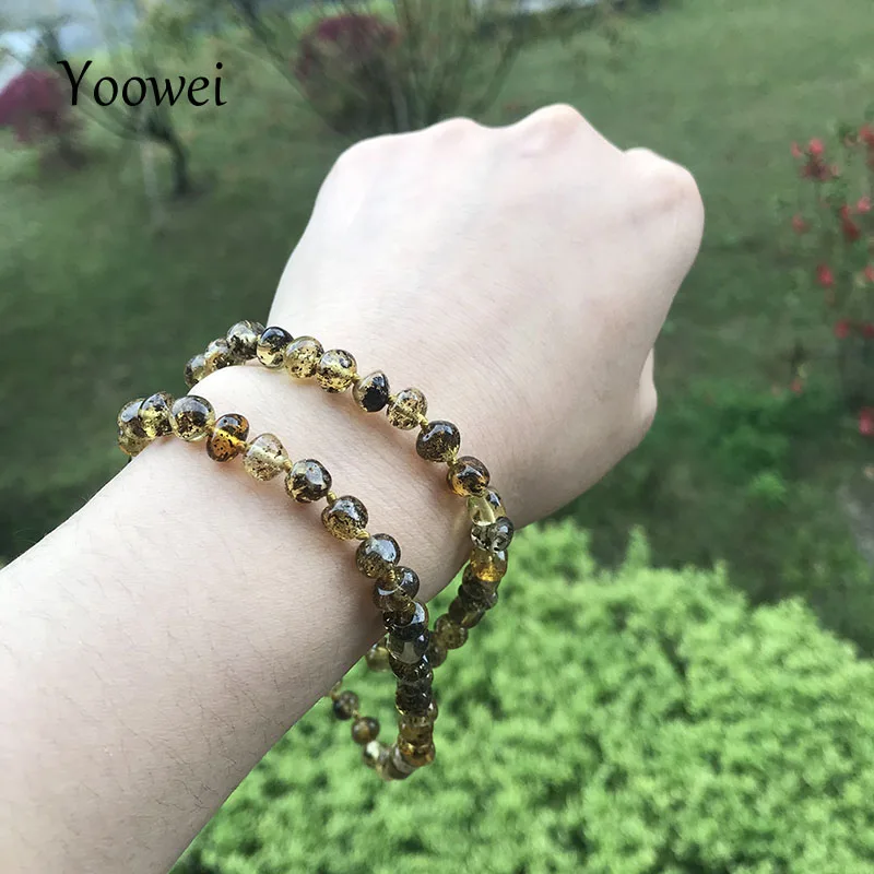 

Yoowei 2020 New Baby Amber Teething Necklace High Quality Gift for Birthday Unique Adult Infant Green Amber Jewelry Wholesale