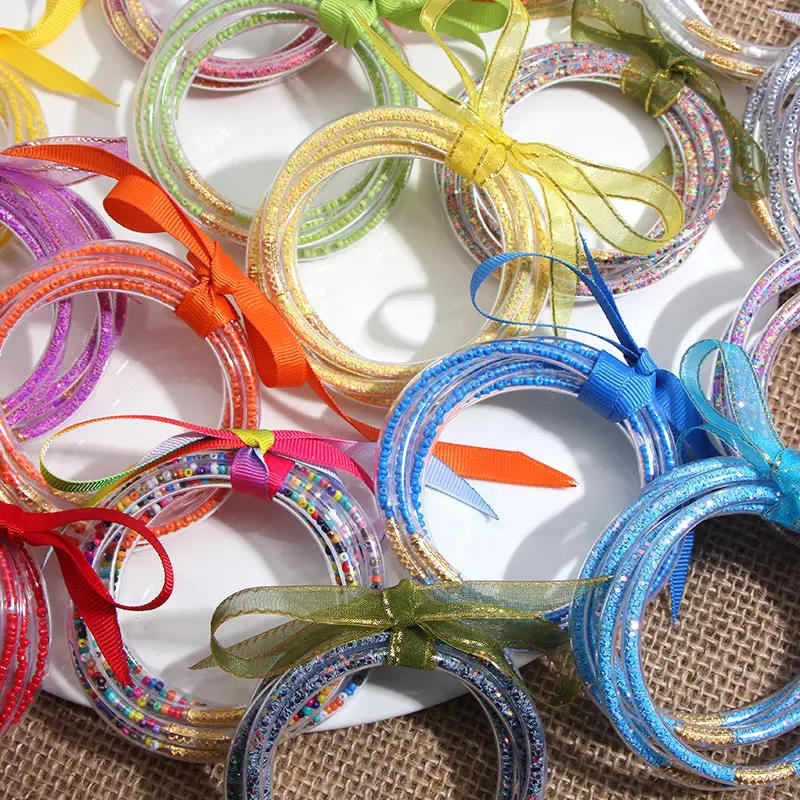 JJFOUCS 5 шт./компл. блестящие желе браслеты 32 цвета бусины заполнены силиконовые пластиковые браслеты «бантик» для женщин девочек любую погоду оптом