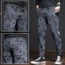 Pantalones de Hip Hop para hombre, moda coreana, pantalones informales holgados con lazo para pies, color negro y azul, ropa de marca, otoño e invierno, novedad