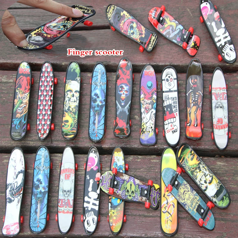4pcs-set-Random-Colored-Creative-Cartoon-Small-Plastic-Finger-Skateboards-Kids-Adult-Educational-Toys-Birthday-Gifts (1)