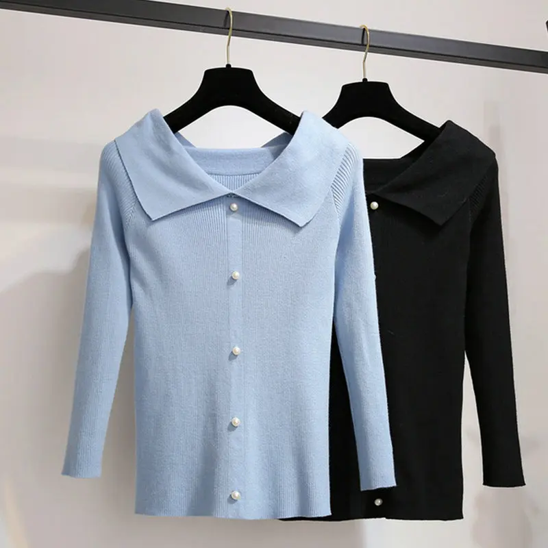 2020 Woman Spring Pullover Sweater Light Blue Black Pearl Button Design Knitted Tops Women Peter Pan Collar Knitwear Sweaters
2020 Woman Spring Pullover Sweater Light Blue Black Pearl Button Design Knitted Tops Women Peter Pan Collar Knitwear Sweaters
