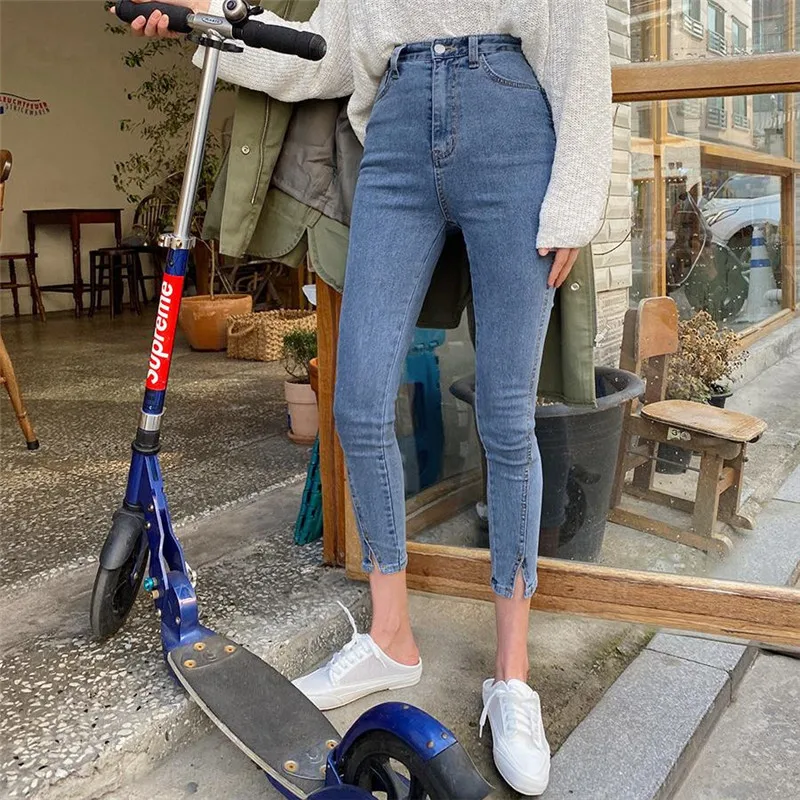 Korean version of the new slim slim high waist split jeans summer 2020 casual tight fashion nine points jeans Korean version of the new slim slim high waist split jeans summer 2020 casual tight fashion nine points jeans