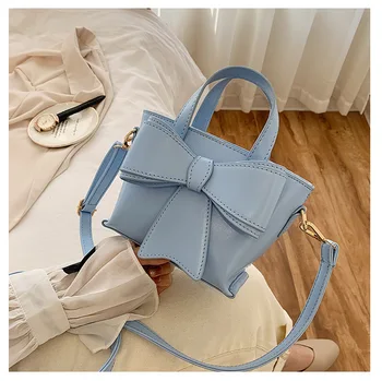 

Free shipping early autumn simple style temperament small bag student bow knot one shoulder messenger bag small fresh handbag