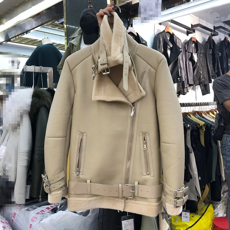 

Autumn and Winter 2009 Korean version of loose stand collar lamb wool plus Plush warm fur locomotive PU leather jacket woman