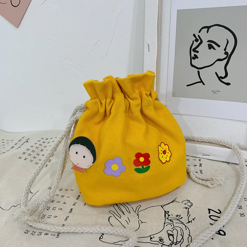 

On the new bucket bag female bag 2020 new pumping shoulder bag summer small fresh messenger canvas bag