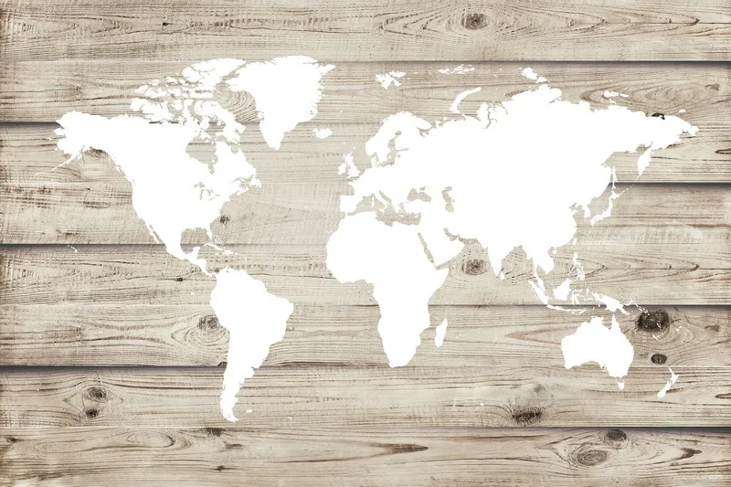 Photo World map on wooden background