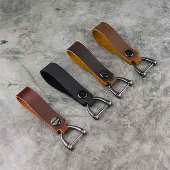 

Hand-woven leather cord keychain buckle men and women couple car chain ring ring pendant Suitable for all car key remotes