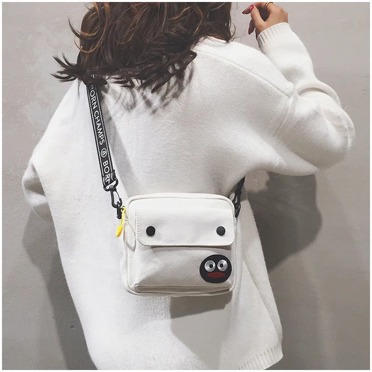 

Korean canvas stereo small square bag sausage mouth monster face shoulder diagonal women's bag