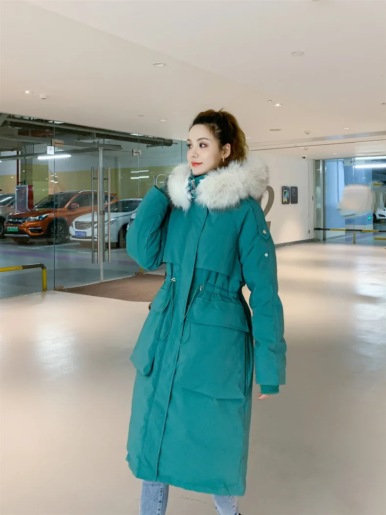 Новинка зимы Стиль корейско-Стиль! большой карман так же есть щука и плюс-размер затрудняетесь в выборе правильного размера? С капюшоном большой меховой воротник толстые высокие сапоги с голенищем выше колена; пуховая куртка
